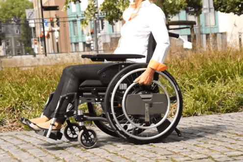 WheelDrive power assist for wheelchairs. Go further.